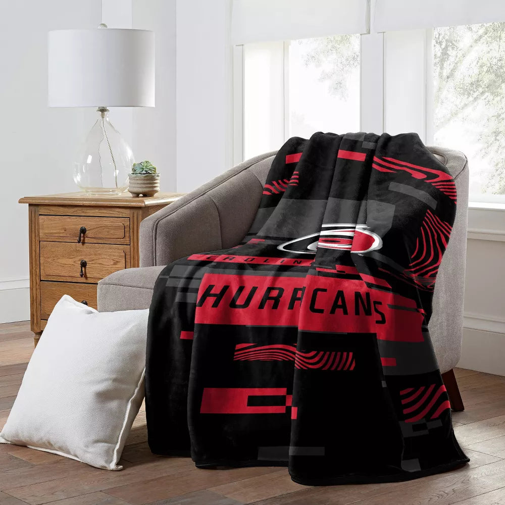 NHL Carolina Hurricanes 60" x 80" Digitize Raschel Throw Blanket